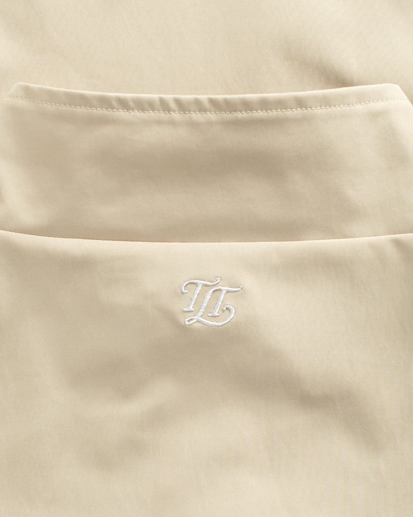 EMBLEM TRACK HALF ZIP