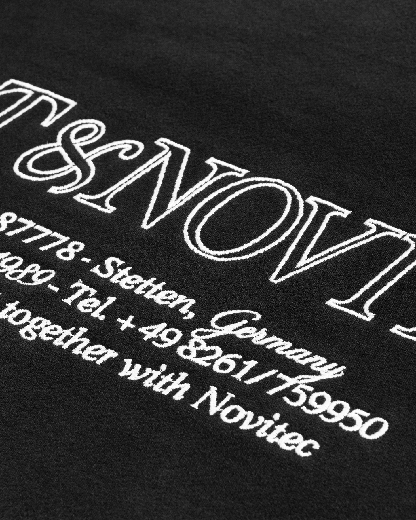 CREST RAGLAN SWEATER