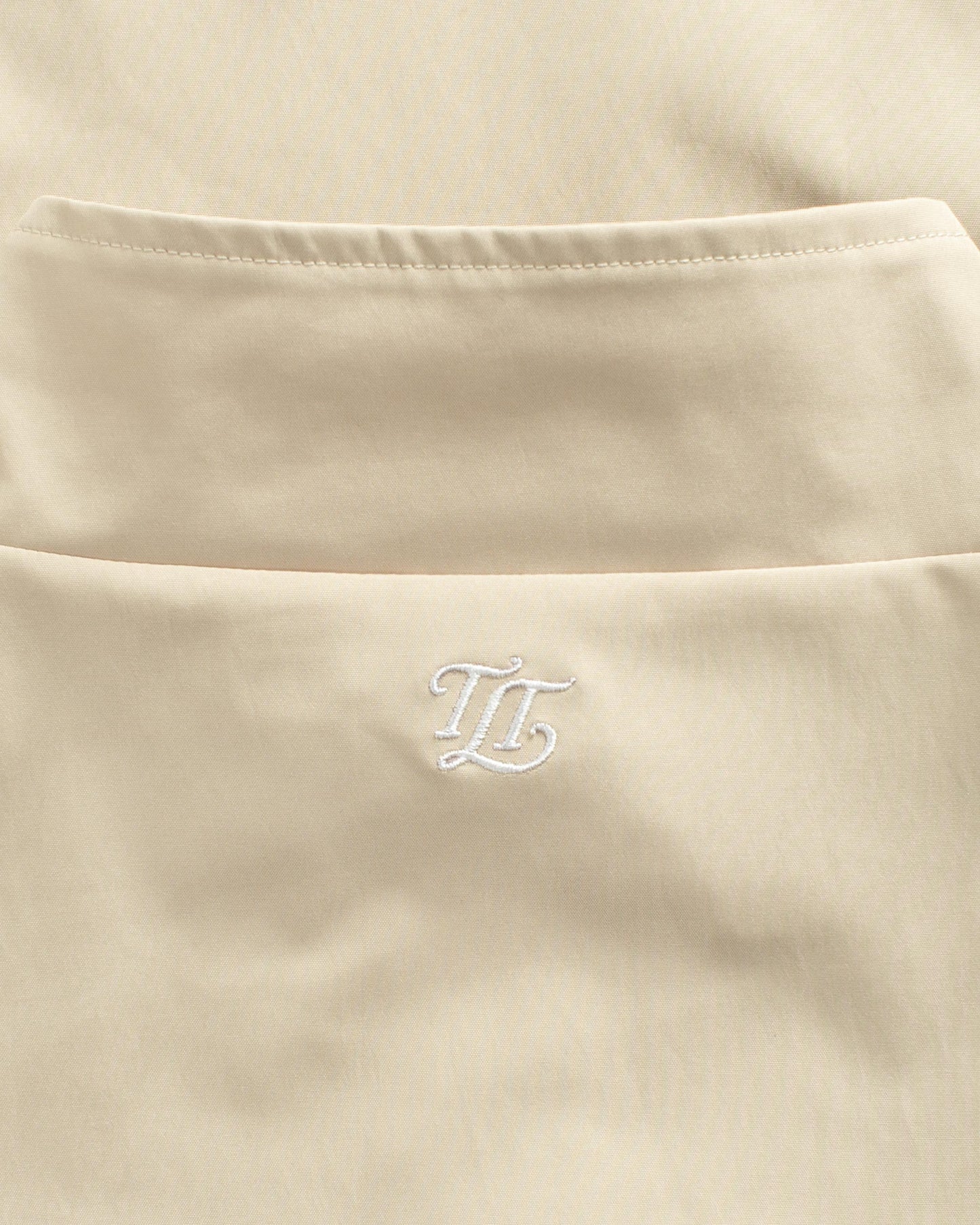 EMBLEM TRACK HALF ZIP